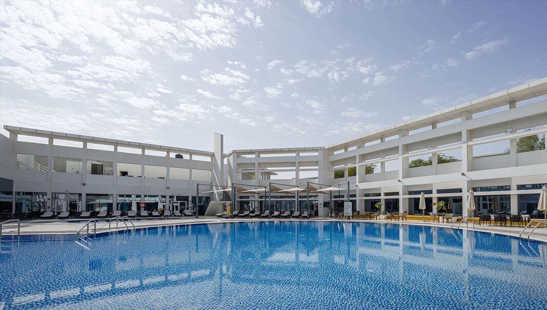 Outdoor swimming pool at Mesaimeer City